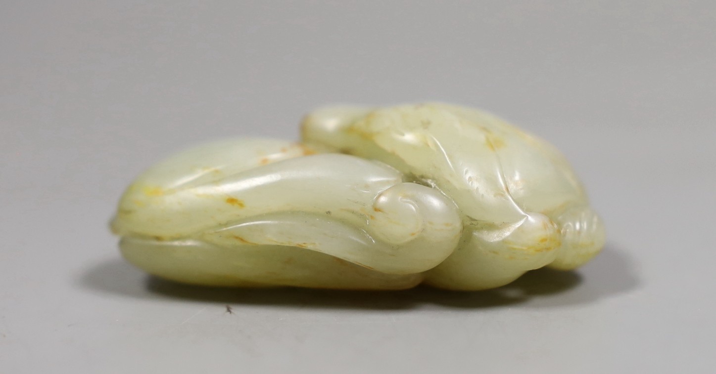 A Chinese jade carving of a sleeping dog, 6cm wide
